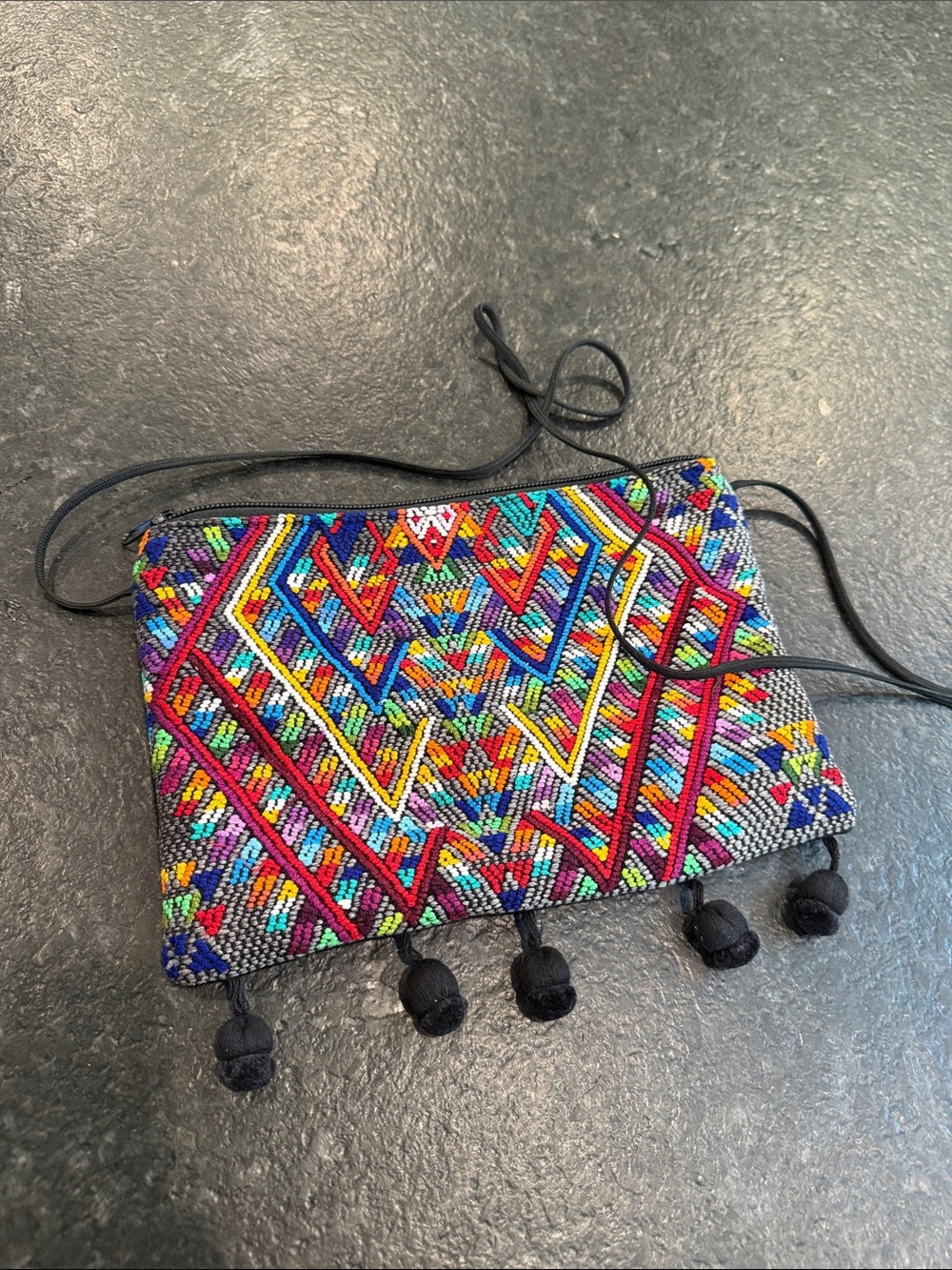 Multicolor Embroidered Crossbody Bag with Black Tassel Accents